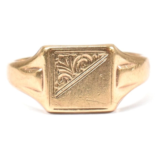 149 - A hallmarked 9ct gold signet ring. The 9ct yellow signet ring having a squared head, half decorated ... 