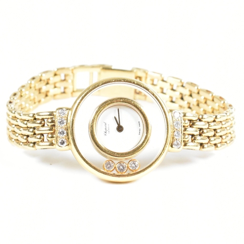 18 - A Chopard 18ct gold Happy Diamonds ladies wristwatch. The 18ct gold Chopard ladies wristwatch having... 