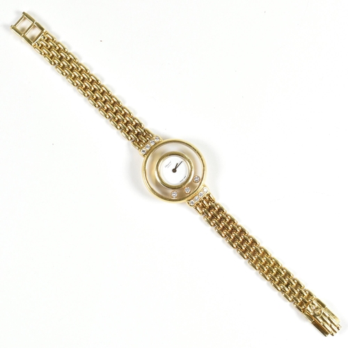 18 - A Chopard 18ct gold Happy Diamonds ladies wristwatch. The 18ct gold Chopard ladies wristwatch having... 