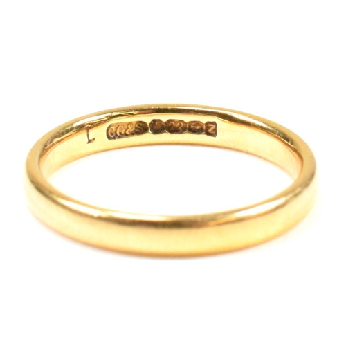 181 - A hallmarked 22ct gold band ring. The 22ct yellow gold hallmarked for Birmingham, 1949. Maker's mark... 