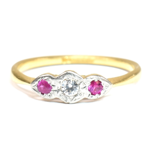 190 - An 18ct gold and platinum synthetic ruby and spinel ring. The ring having a central illusion set rou... 