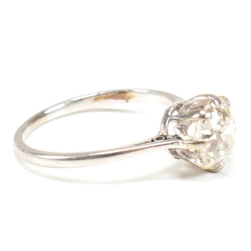 24A - A 1930s 18ct gold and diamond solitaire ring. The ring having an eight claw mounted old European cut... 