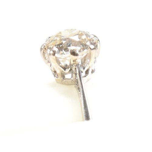 24A - A 1930s 18ct gold and diamond solitaire ring. The ring having an eight claw mounted old European cut... 