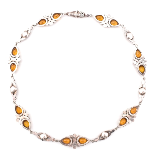 3 - A 19th century silver and paste choker necklace. The 19th century necklace having collect set orange... 