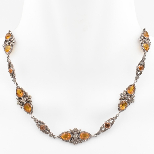 3 - A 19th century silver and paste choker necklace. The 19th century necklace having collect set orange... 