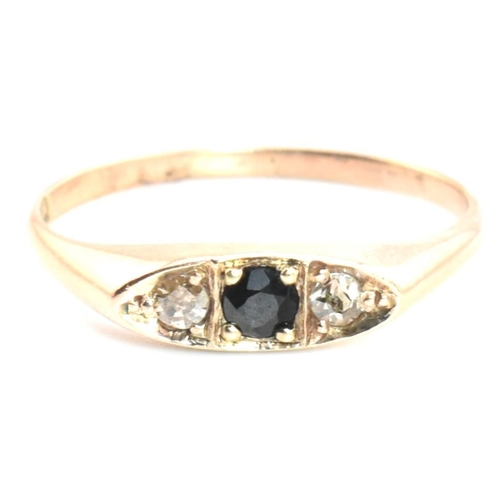 354 - A 10ct gold, sapphire and diamond boat ring. The 10ct rose gold ring having a central four claw roun... 