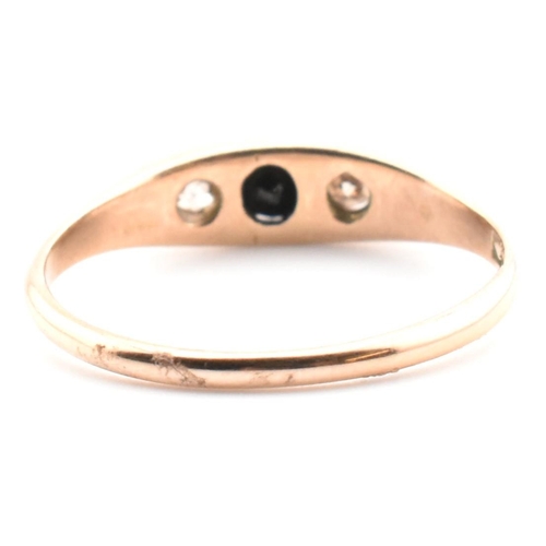 354 - A 10ct gold, sapphire and diamond boat ring. The 10ct rose gold ring having a central four claw roun... 