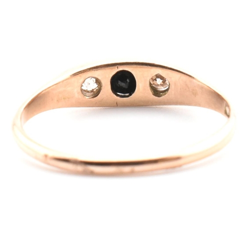 354 - A 10ct gold, sapphire and diamond boat ring. The 10ct rose gold ring having a central four claw roun... 