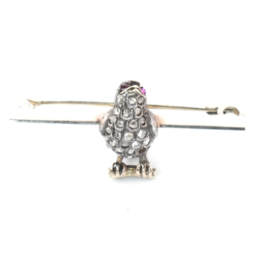 39 - An early 20th century diamond bird brooch pin. The brooch pin in the form of a small bird set with r... 