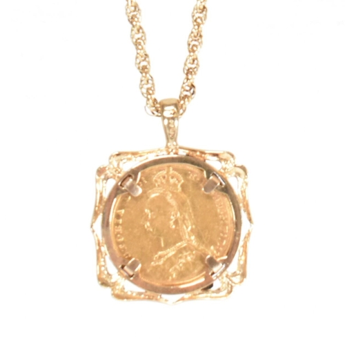 45 - A mounted full 1888 sovereign coin pendant necklace. The hallmarked 9ct gold twisted fancy link chai... 