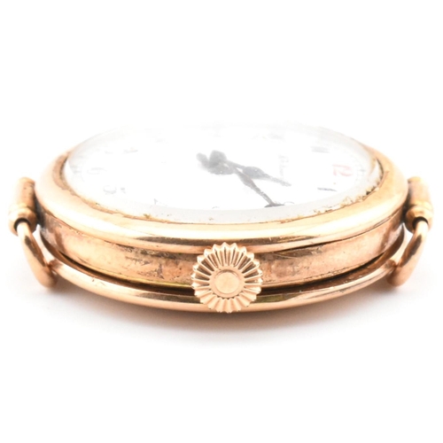 46A - A Henry Moser & Cie - Swiss 14k gold wristwatch. The watch with enamel Arabic dial signed Hy. Moser ... 