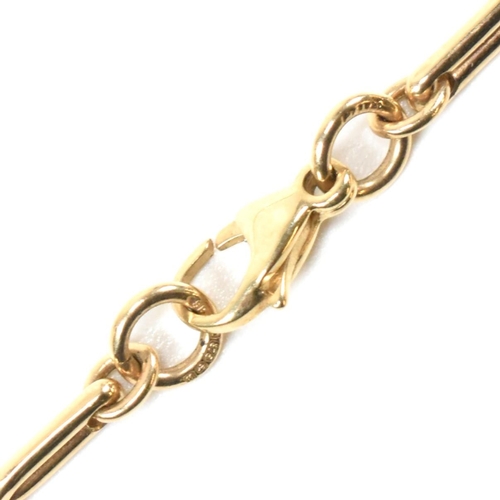 49 - A hallmarked 9ct gold twisted bar link chain necklace. The 9ct yellow gold chain necklace having twi... 