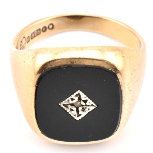 54 - A hallmarked 9ct gold onyx and diamond signet ring. The 9ct yellow gold signet ring having a rectang... 