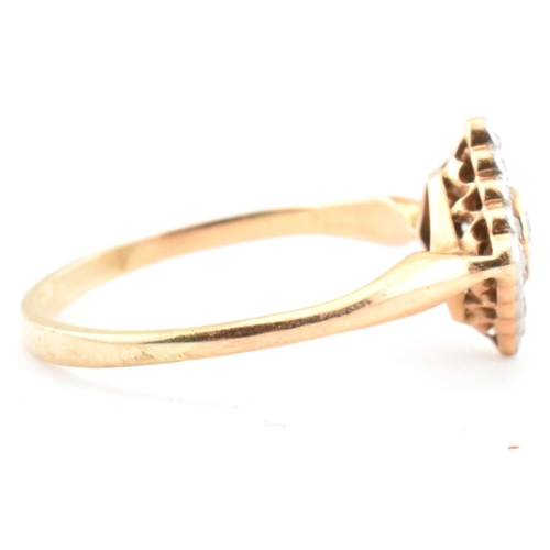 60 - A gold and diamond Art Deco lozenge ring. The Art Deco yellow gold ring having a central bezel set r... 