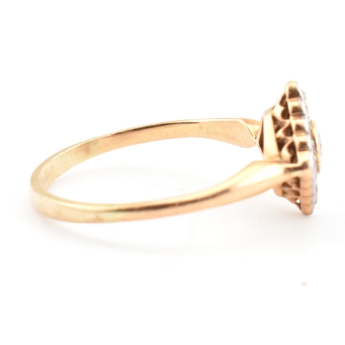 60 - A gold and diamond Art Deco lozenge ring. The Art Deco yellow gold ring having a central bezel set r... 