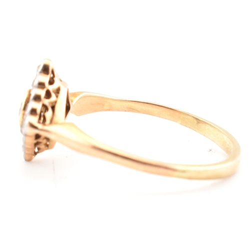 60 - A gold and diamond Art Deco lozenge ring. The Art Deco yellow gold ring having a central bezel set r... 