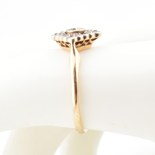 60 - A gold and diamond Art Deco lozenge ring. The Art Deco yellow gold ring having a central bezel set r... 