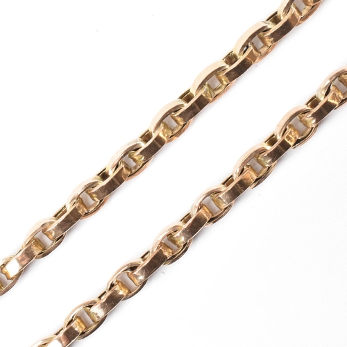 62 - A 9ct gold Albert chain. The 9ct gold Albert chain having cable links and a swivel dog lead clasp to... 