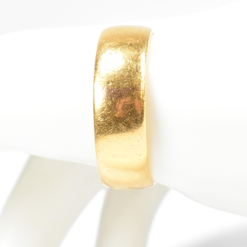 71 - A hallmarked 22ct gold band ring. The 22ct yellow gold band ring hallmarked for London, 1961. Size X... 