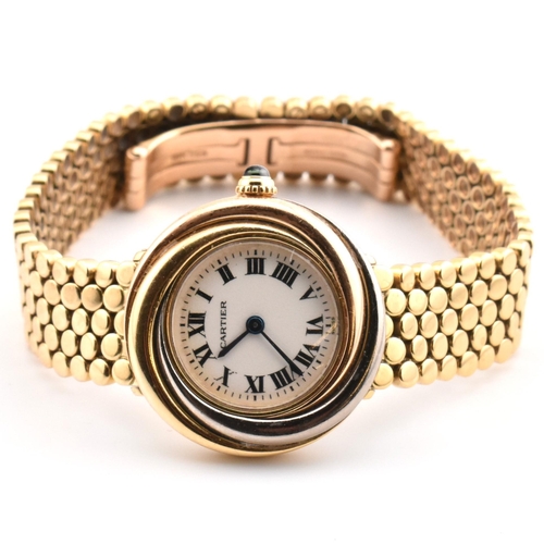 8 - A Cartier Trinity 18ct tri-colour gold wristwatch. The Cartier ladies 18ct gold wristwatch having an... 