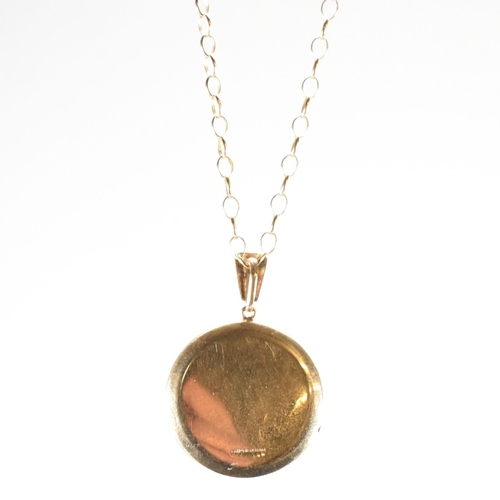 86 - A Georg Jensen hallmarked 9ct gold locket pendant necklace. The hallmarked 9ct gold cable chain neck... 