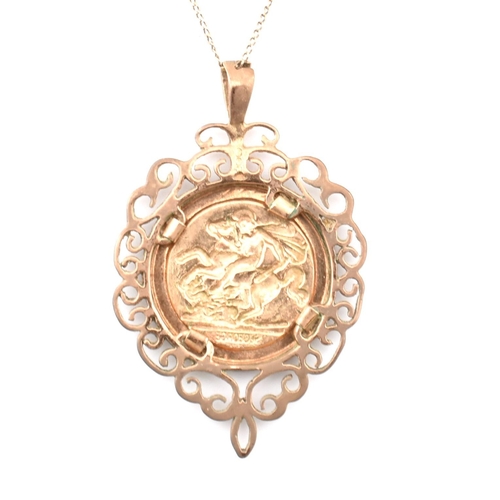 90 - A hallmarked 9ct gold mounted St Christopher pendant necklace. The hallmarked 9ct yellow gold curb l... 