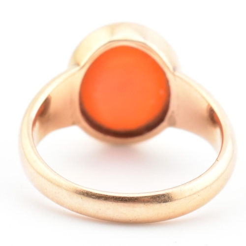 93 - A gold and carnelian intaglio signet ring. The signet ring set with a carnelian intaglio seal depict... 