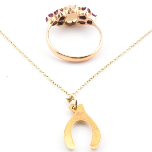 96 - A gold, opal and ruby ring together with a hallmarked 9ct gold pendant necklace AF. The lot to inclu... 