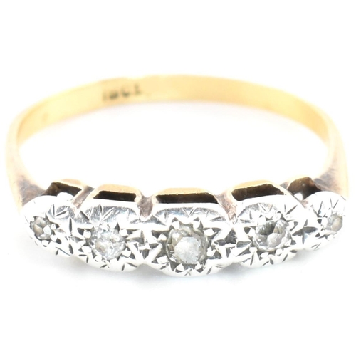 98 - A 18ct gold and diamond five stone ring. The 18ct ring set having five graduating illusion set diamo... 