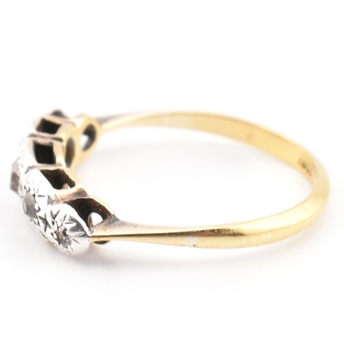 98 - A 18ct gold and diamond five stone ring. The 18ct ring set having five graduating illusion set diamo... 