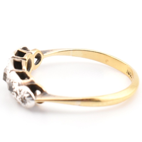 98 - A 18ct gold and diamond five stone ring. The 18ct ring set having five graduating illusion set diamo... 