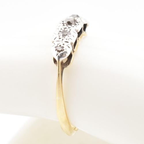 98 - A 18ct gold and diamond five stone ring. The 18ct ring set having five graduating illusion set diamo... 