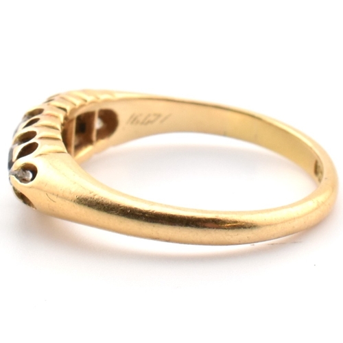 120a - An 18ct gold and diamond five stone ring. The 18ct yellow gold ring set with a single row of five ol... 