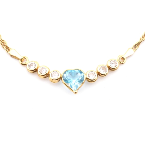 155a - A hallmarked 18ct gold, topaz and CZ pendant necklace. The Italian 18ct yellow gold necklace having ... 