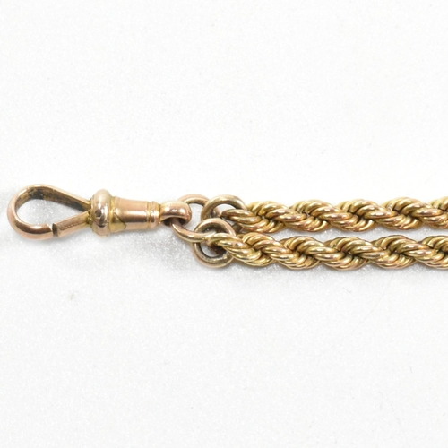 22a - A Victorian 9ct gold leontine watch chain. The leontine having a heart motif linked by rope twist ch... 