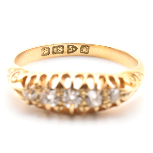 45a - An Edwardian hallmarked 18ct gold and diamond five stone gypsy ring. The 18ct yellow gold ring set w... 