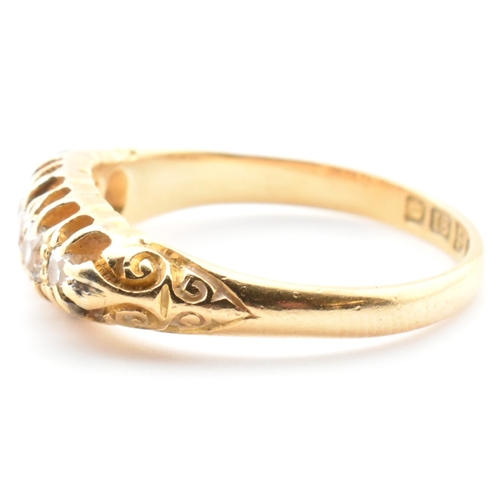 45a - An Edwardian hallmarked 18ct gold and diamond five stone gypsy ring. The 18ct yellow gold ring set w... 