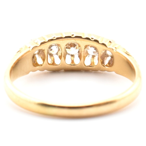 45a - An Edwardian hallmarked 18ct gold and diamond five stone gypsy ring. The 18ct yellow gold ring set w... 