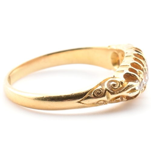 45a - An Edwardian hallmarked 18ct gold and diamond five stone gypsy ring. The 18ct yellow gold ring set w... 