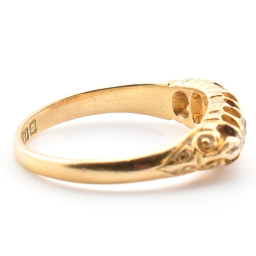 45a - An Edwardian hallmarked 18ct gold and diamond five stone gypsy ring. The 18ct yellow gold ring set w... 