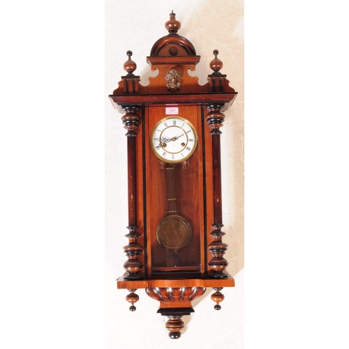 1007 - A 19th century Victorian mahogany Vienna regulatory wall clock. The clock having Gothic inspired ped... 