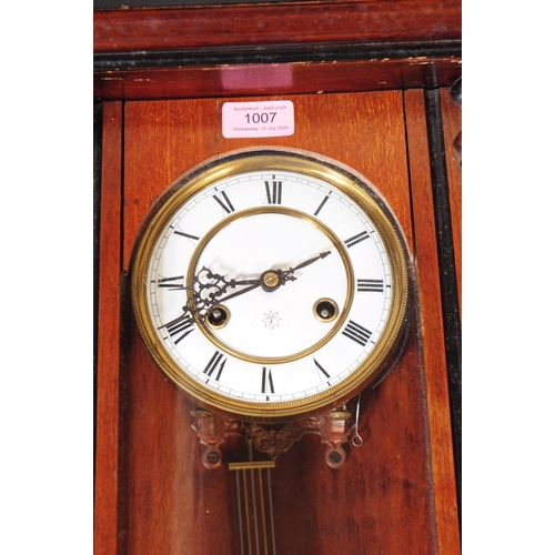 1007 - A 19th century Victorian mahogany Vienna regulatory wall clock. The clock having Gothic inspired ped... 