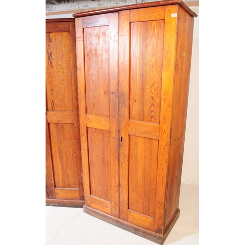 1008 - A pair of early 20th century oak wood church / Sunday school cupboards. The cupboards raised on plin... 