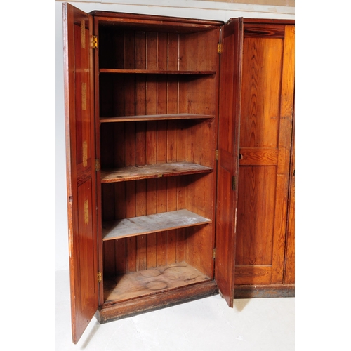 1008 - A pair of early 20th century oak wood church / Sunday school cupboards. The cupboards raised on plin... 