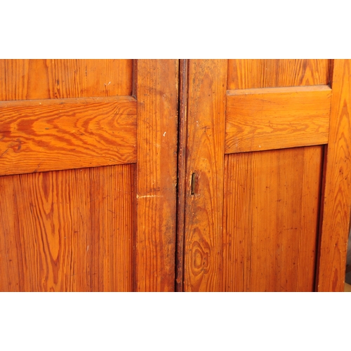 1008 - A pair of early 20th century oak wood church / Sunday school cupboards. The cupboards raised on plin... 