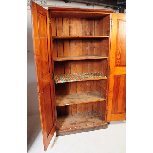 1008 - A pair of early 20th century oak wood church / Sunday school cupboards. The cupboards raised on plin... 