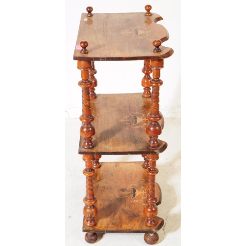 1010 - A 19th century Victorian walnut inlaid whatnot etagere. The etagere having three shelves each with i... 