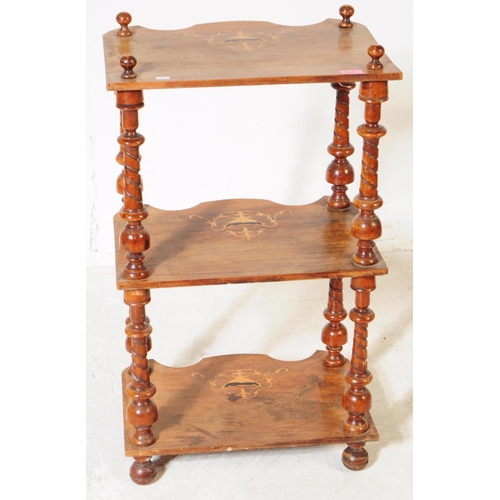 1010 - A 19th century Victorian walnut inlaid whatnot etagere. The etagere having three shelves each with i... 