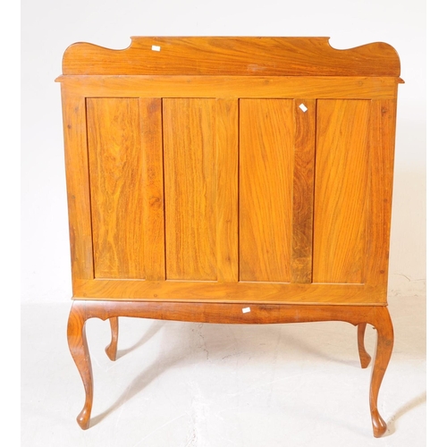 1013 - A French Directoire revival rosewood barrel top cylinder bureau desk. The desk raised on cabriole le... 