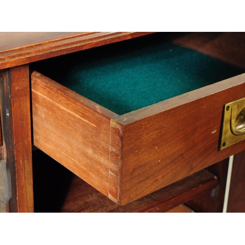 1014 - A 19th century Victorian mahogany Art Nouveau cabinet cupboard. The cupboard raised on a plinth base... 